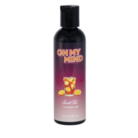 The On My Mind-Sweet Tea Flavored Lube 4oz features a gradient purple label with iced tea and lemon images, a sleek black cap, and offers extra moisture for daily comfort.