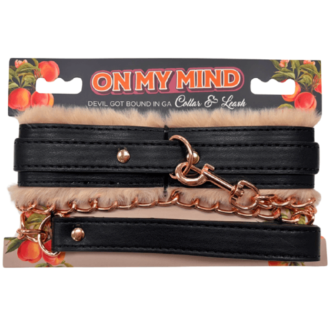 The On My Mind - Devil Got Bound in GA - Collar & Leash set features rose gold hardware, a cozy brown fur lining, and comes in vintage peach packaging. Its an essential piece for any Collar & Leash collection.