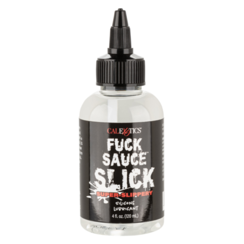 A 4 oz bottle of premium silicone lubricant, labeled Fuck Sauce Slick Silicone Lubricant, featuring a sleek black and white design. Equipped with a nozzle for easy dispensing, it's perfect for enhancing your intimate experiences.