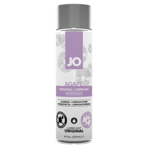 Illustration of a rocket within a circular emblem against a starry background, symbolizing the effortless glide reminiscent of JO Agape Original WB 4oz's natural lubrication. The phrase 