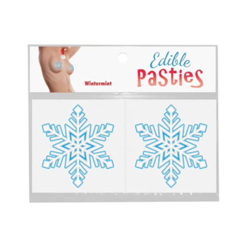 Packaging of Snowflake Pasties decorated with two blue snowflake designs and labeled Wintermint. The packaging includes an image of a model wearing one of the pasties on their chest.