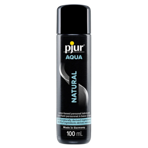 A bottle of Pjur Aqua Natural 3.4oz personal lubricant, featuring a black design. The label emphasizes its plant-based formula with 99.5% naturally derived ingredients, highlighting its water-based composition and premium quality made in Germany.